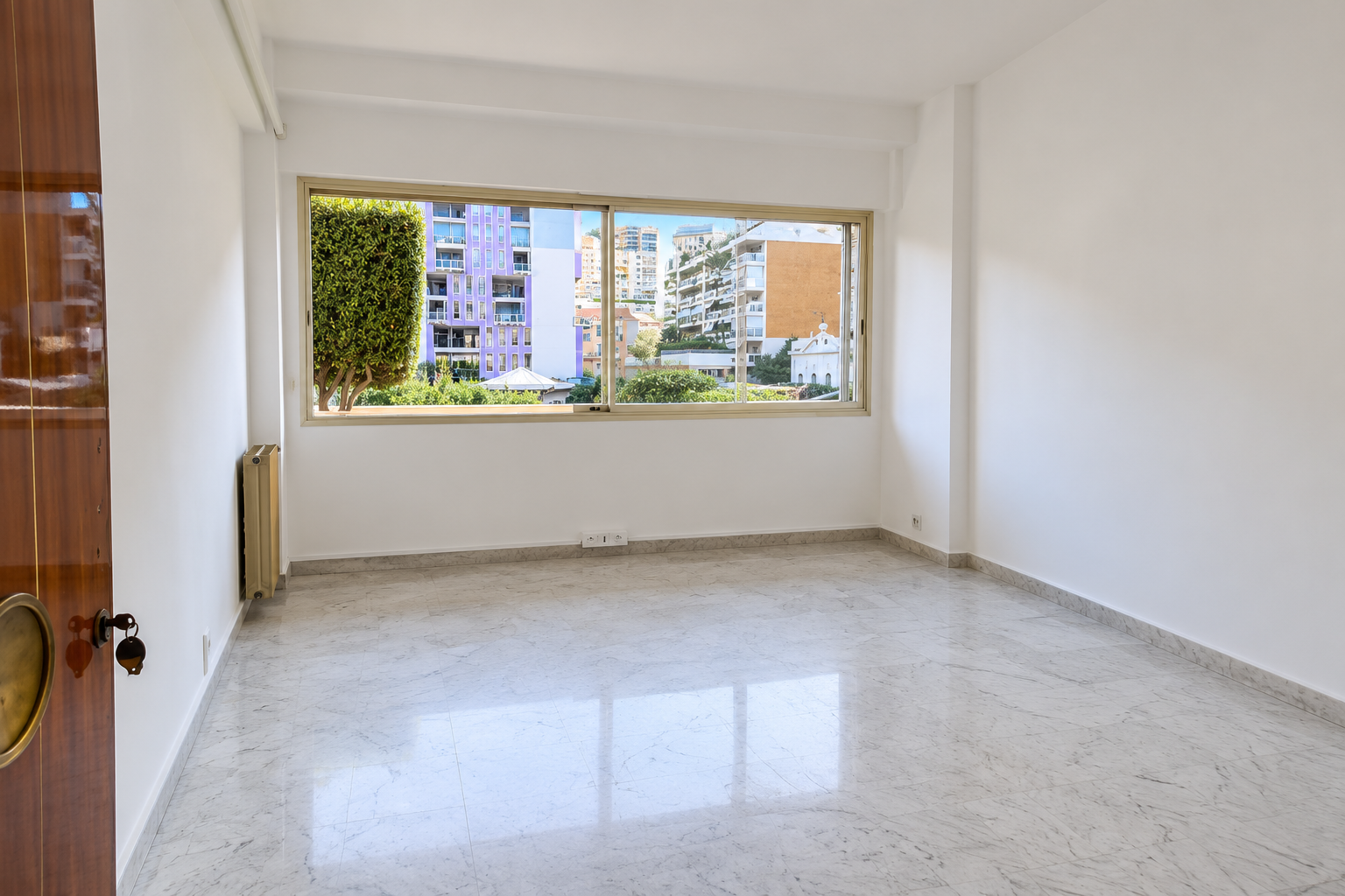 Unfurnished main living room with a large window